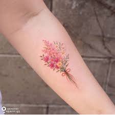 9 073 Likes 18 Comments Lets Tattoo The World Tattoozoan On Instagram Family Birth Flower Ar Birth Flower Tattoos Bouquet Tattoo Flower Bouquet Tattoo