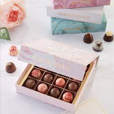 Luxury Giftable Chocolate Truffles Oil And Water Inspired Library Explores The Best Chocolate Flavors From Around The World World Brand Design Chocolate Truffles Chocolate Truffles Packaging Truffles