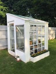I have some old windows from renovating the house i bought and had thought of making a green house, but wasn't sure how'd i do it. 320 Old Window Greenhouse Ideas Greenhouse Window Greenhouse Old Window Greenhouse