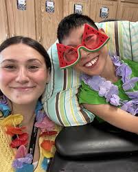 Room 121 ended last week with a Luau party! Cameron, Max, Ryan, and their  classmates played Luau bingo and made some delicious sand pudding for  dessert with Paraeducators Shemeka Hooks and Aiesha