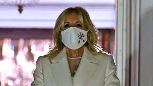 Jill biden ushered in her role as the next first lady of the united states at a victory rally in wilmington, de. Jill Biden S Inauguration Evening Dress Featured A Subtle Message Of Unity Entertainment Tonight