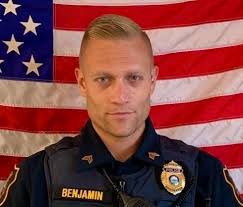 Rochester officer skating in CHaD Battle of Badges