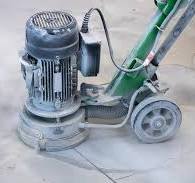Grinding of concrete with a grinding machine repair of ...