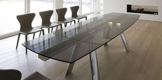 The contemporary glossy black table will compliment any dining room. 15 Superb Stainless Steel Dining Table Designs Home Design Lover