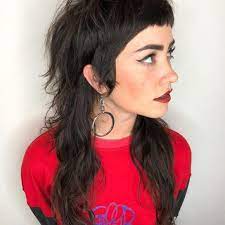 Black Fringe Shag With Messy Straight Texture And Chunky Yellow Highlights The Latest Hairstyles For Men And Women 2020 Hairstyleology Mullet Haircut Brunette Hair Color Mullet Hairstyle