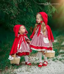 The story of a naive girl, heroic lumberjack, unlucky grandmother and a big bad wolf dates back to story telling french peasants in the 14th century and became widely distributed when the brothers grimm created their. Oh These Two Dollcakeincharacter Characterdress Littleredridinghood Hello Red Riding Hood Costume Kids Red Riding Hood Costume Little Red Riding Hood