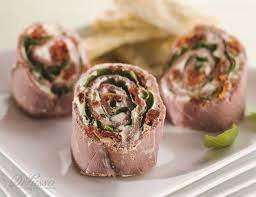 Roast Beef And Sun Dried Tomato Rollups Di Lusso Deli Recipe Roast Beef Deli Meat Deli Meat Recipes Sliced Roast Beef