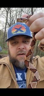 What type of snake is found at Bear Trap golf course?