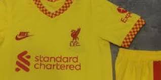 The new kit is yellow in general with red trim, while sleeves are checker in design. Photo New Leaked Snap Of Liverpool S Bold 2021 22 Third Kit With Shorts It Ll Split Fans