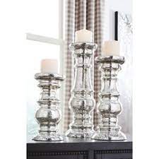 These measure 3 inches tall and 4.5 inches across the base. 3 Tier Glass Candle Holder Wayfair