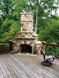 Stone Stacked Massive Corner Fireplace On Wooden Deck Outdoor Outdoor Fireplace Outside Fireplace Deck Fireplace
