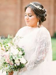 Place your veil in the back of the style so it falls in line with the curls for a seamless look. 29 Vintage Wedding Hairstyles To Steal From Every Decade