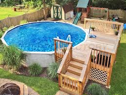 Pool Deck Ideas Partial Deck The Pool Factory Pool Deck Plans Pool Deck Decorations Above Ground Pool Landscaping