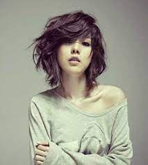 This hairstyle is one of the simple ones, however, there are a lot of layers, which look very classy. Short Bob Haircuts For Thick Curly Hair Jelitaf