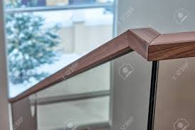 Note that some sections of stair railing code work in conjunction with other sections of stair code. Beautiful Modern Glass Railing For Wooden Staircase With Wooden Stock Photo Picture And Royalty Free Image Image 120652518