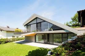How to prepare your pets and children for a roof replacement. Slope Roof House With Futuristic Interiors