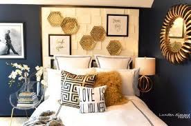 Using A Rich Navy Blue Wall Color White Black And Gold Decor Were Used To Brighten The Space And Make T Gold Bedroom Blue And Gold Bedroom White Gold Bedroom