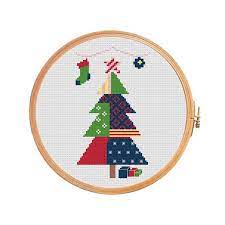 Alicia paulson is the maker behind a series of felt ornament patterns that she used to release stitch the halls is a very special embroidery book filled with wonderful projects for the christmas season. Patchwork Christmas Tree Cross Stitch Pattern Modern Cross Stitch Pattern M Decoration Ideas Christmas Cross Stitch Cross Stitch Patterns Christmas Modern Cross Stitch Patterns