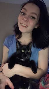 212 north 4th street Buckley Corner of 4th and north street Gray ranch with  a black truck in the driveway. And a black soloist...