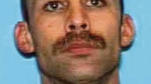 Standoff: Wanted parolee arrested