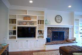 Do i have room for a dining table and 6 or 8 chairs and still allow room for people to get by and move around the table. Make Your Fireplace Different Than Others With Bookshelves Decorations 33 Best Pictures Dexorate Fireplace Built Ins Built In Wall Units Built In Around Fireplace