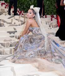 A quick google search on ariana grande inspired lookbooks will show you that two of her go to looks are crop tops and bralettes. Met Gala 2018 The Celebrities Who Sat On The Stairs Are A Total Mood Glamour