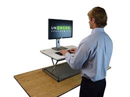 The table topper has a rounded edge design; Small Ergonomic Laptop Standing Desk Converter Riser Compact Sit Stand Up Topper Stands Holders Car Mounts Computers Tablets Networking