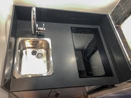 Apartments have a kitchenette with kitchenware and a refrigerator. Kitchenette 80 Cm Dans Placard Cuisiniste Paris Ile De France