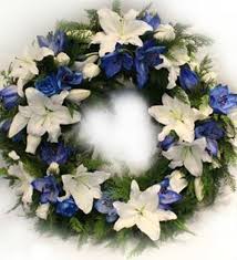 Maybe you would like to learn more about one of these? Fully Decorated Funeral Wreath With White And Blue An Icelandic Lilies Roses And More I Husi Bloma Flower Delivery Shop Iceland