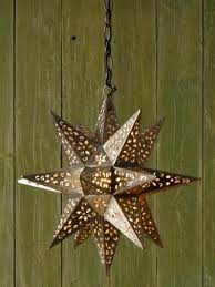 Find punched tin, frosted glass or mirrored glass hanging star fixtures. Pin On Living Room Design