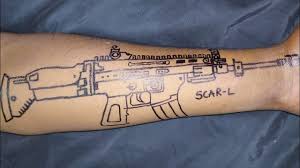 Tattoo guns are a tool that can be used to recolor the player character's or companion's tile and detail color. Scar L Gun Tattoo Free Fire And Pubg Gun Gun Tattoo Hand Tattoo Pen Tattoo Youtube