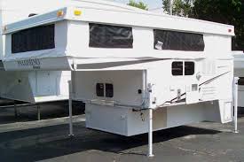 I'm looking to get a camper for my truck and of course want to tow the boat as well. 2011 Palomino Bronco Truck Camper Roaming Times