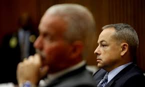 Trial restarts for Detroit policeman who shot seven-year-old girl during  raid