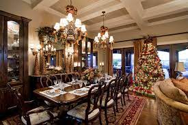 The chandelier in this dining room is decorated by garland and ornaments which totally grabs most of the attention. Traditional Christmas Living And Dining Room Victorian Dining Room Austin By Dawn Hearn Interior Design Houzz
