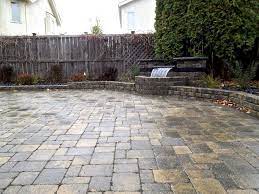 In this video, roman shows you the first step of putting your hardscape patio paver plan into action. Winnipeg Landscaping Roman Paving Stone