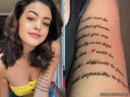 6 how much would a tattoo hurt? Malu Trevejo Writing Upper Arm Tattoo Steal Her Style
