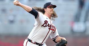 Grant Holmes pitches for the Atlanta Braves against the Philadelphia Phillies