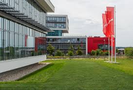 The dasslers, founders of adidas (founded by adolf, adi dassler) and puma (founded by rudolf dassler, older brother of adi). Green Driveway Puma Headquarters Herzogenaurach Germany Fire Access Lanes Grass Pathways