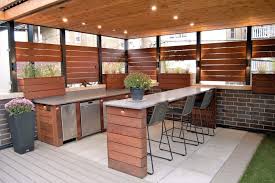 Functional and beautiful outdoor kitchen design and installation for patios, decks, and outdoor living spaces of all sizes. Rooftop Patio Outdoor Space With Outdoor Kitchen Lakeview Chicago Il Urban Rooftops Chicago Roof Decks
