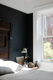 The dark wall color is what initially draws my eye, which then follows it up and down to ogle the dreamy woodwork. Relaxing Black Bedroom Interior Home Home Decor