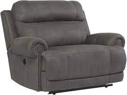 Find the perfect home furnishings at hayneedle, where you can buy online while you explore our room designs and curated looks for tips, ideas & inspiration to help you along the way. Amazon Com Signature Design By Ashley Austere Contemporary Faux Leather Oversized Zero Wall Power Recliner Gray Furniture Decor