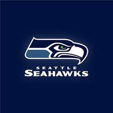 It was first designed in 1975 when the seahawks formed as an expansion team. Hd Wallpaper Seattle Seahawk Sports Logo Blue Background Wallpaper Flare