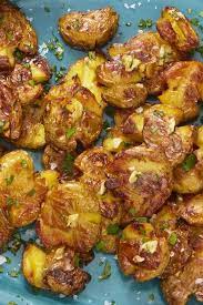 These Crispy Smashed Potatoes With Fresh Herbs Are The Ultimate Holiday Side Dish Recipe Dinner Menu Recipes Easy Potato Recipes Crispy Smashed Potatoes