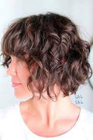 What really sets this layered curly bob out from the other hairstyle is the platinum blonde hair color on short locks. 4 Adorable Short Layered Haircuts For The Summer Fun Hair Beeauty Short Layered Haircuts Short Hair Styles How To Curl Short Hair