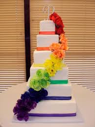 I Think A Rainbow Wedding Would Be Cool Bride In White Groom In Black Bridesmaids In Bright Colored Dre Rainbow Wedding Cake Colorful Cakes Rainbow Wedding