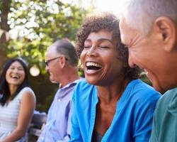 Image of group of people laughing and having a good time