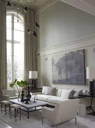 An accent wall is a great way to break up a space, especially in a living room with high ceilings. 24 Ideas On How To Decorate Tall Walls Remodelaholic Living Decor High Ceiling Living Room Decorate Tall Walls