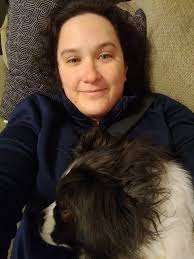 Tuxedo cat loves to sleep and eat