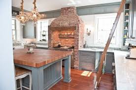 Wouldn T You Just Love To Insert Your Stove Into A 222 Year Old Brick Fireplace Like This One Exposed Brick Kitchen Brick Kitchen Traditional Kitchen Design