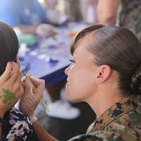 US Air Force (USAF) Major General James Sandstrom (right) Commander, 19th  Air Force, exchanges salutes with USAF Colonel (COL) Mark S. Solo,  In-Coming Commander, 97th Air Mobility Wing (AMW), during the Wings